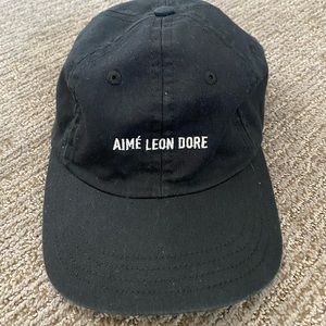 Aime leon dire hat
